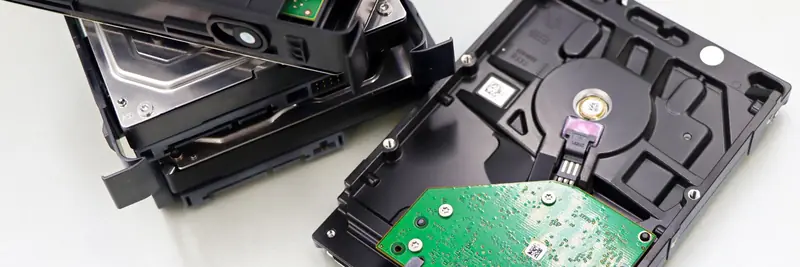 Rows of hard drives seated in a data centre storage array