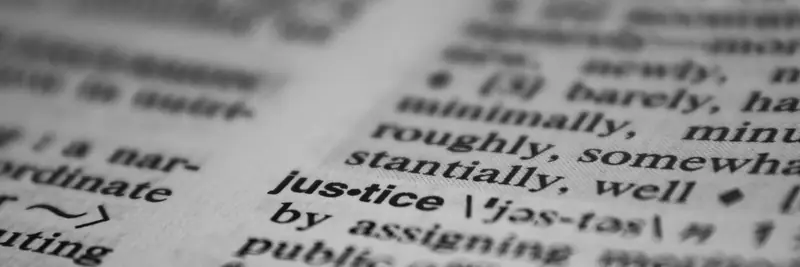 A dictionary page with a definition in sharp focus