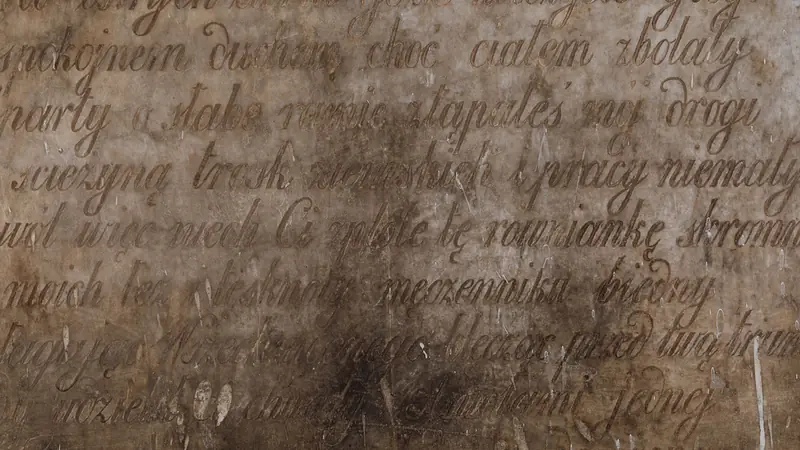 Printed text in several alphabets overlaid on one page