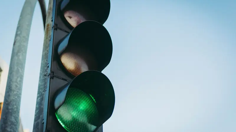 Traffic lights showing red, amber and green