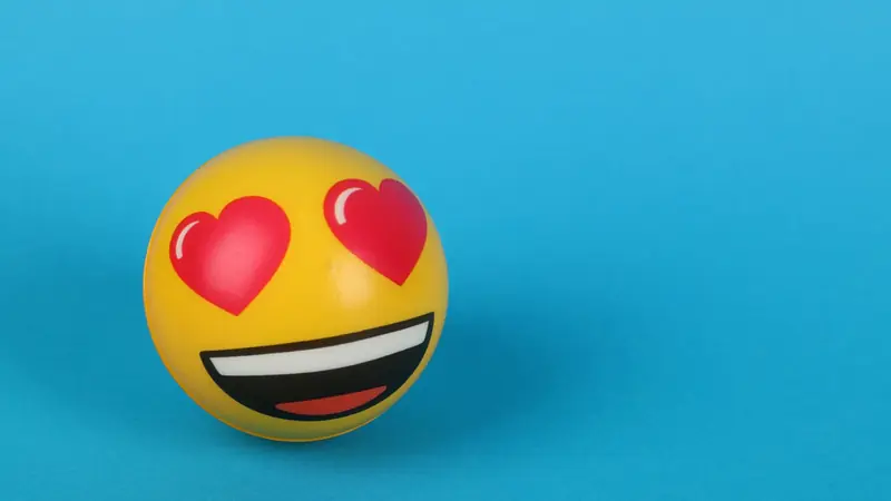 Colourful emoji symbols displayed on a screen